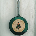 Token with embroidery