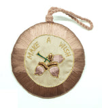 Token with embroidery